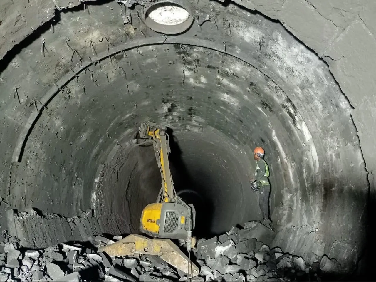 Brokk demolition robot working inside a metro tunnel lining